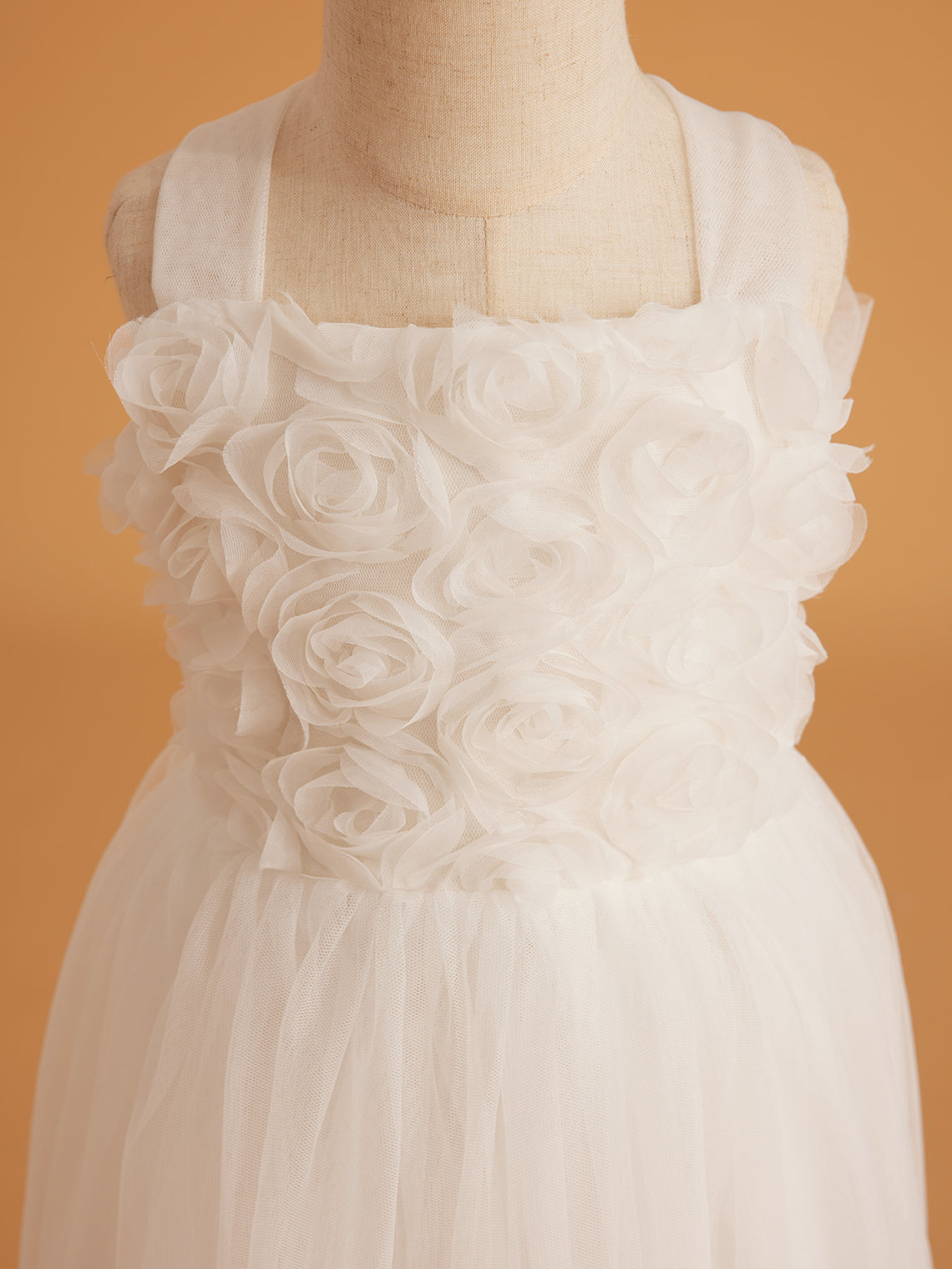 Vestido de bebé niña con lazo de tul y aplique floral en 3D de la colección Jardín Encantado 