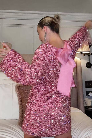 Robe mini ample à paillettes et nœud dans le dos, idéale pour danser toute la nuit 