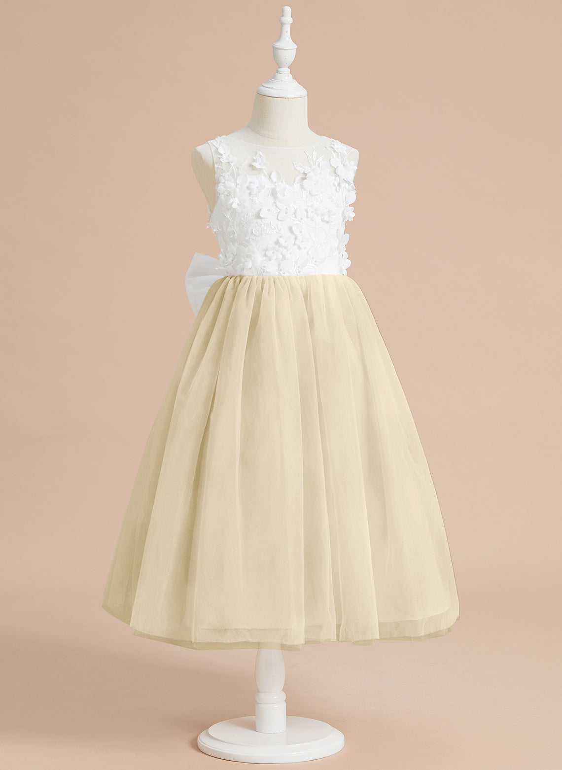Vestido midi de encaje floral y lazo grande 