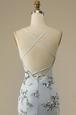 Robe de bal dos nu à fines bretelles ornée de perles