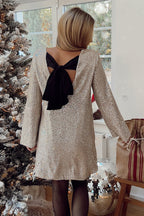 Robe mini ample à sequins et nœud papillon dans le dos, inspirée par Lost in Your Eyes 