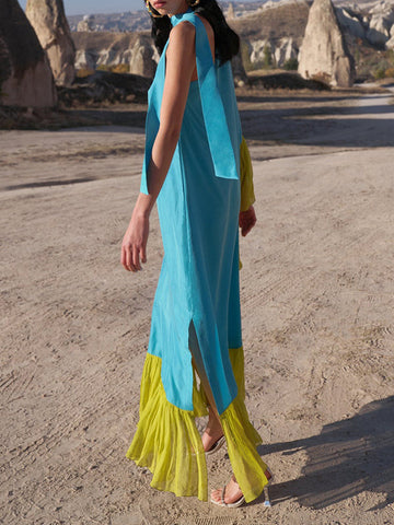 Vestidos largos de noche asimétricos, sueltos, con pliegues en contraste, abertura lateral y un solo hombro. 