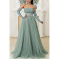 Robe de mariée longue trapèze en tulle froncé à paillettes et sans bretelles