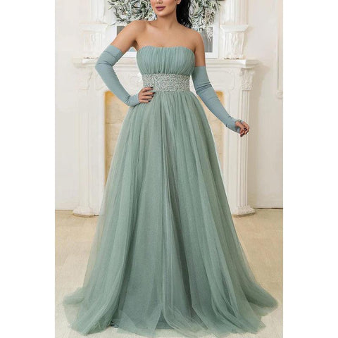 Vestido de novia largo de corte A, sin tirantes, sin mangas, con lentejuelas y tul fruncido.