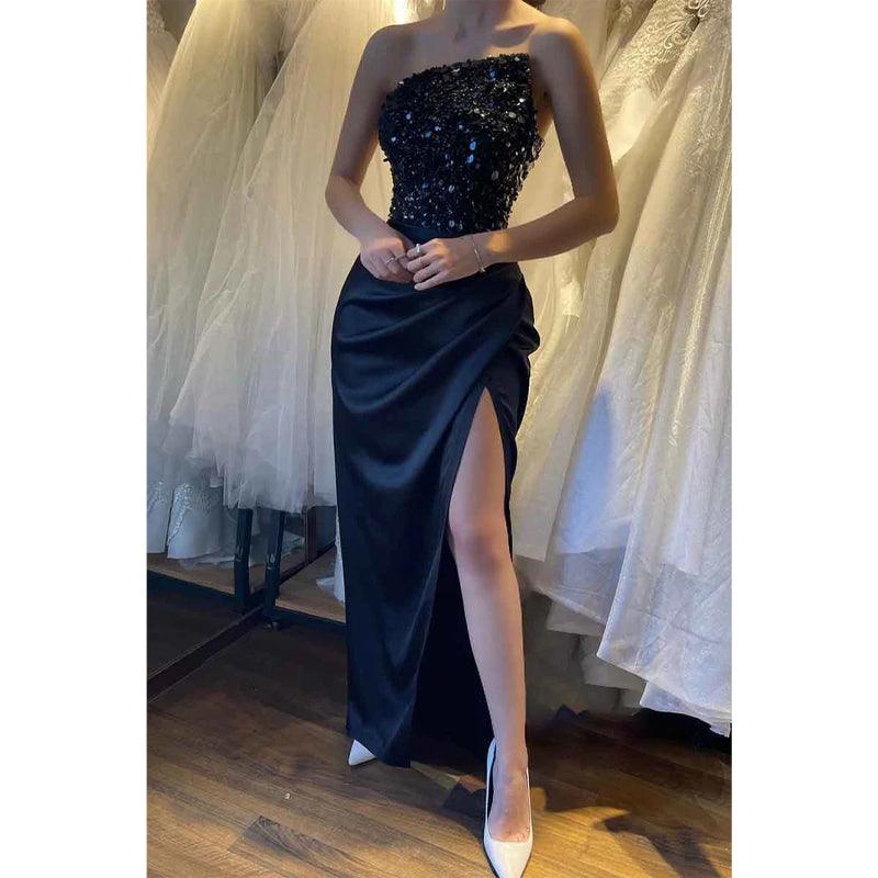 Robe de soirée longue noire sans bretelles avec haut à paillettes et fente 