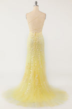 Robe de bal dos nu à fines bretelles