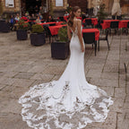 Vestidos de novia de alta calidad con tirantes finos, escote en V, espalda descubierta, apliques de encaje, cola de barrido, corte sirena.