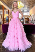 Vestido largo de fiesta rosa con tirantes finos, corte en A y volantes