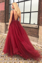 Robe de bal longue bordeaux à perles et fente
