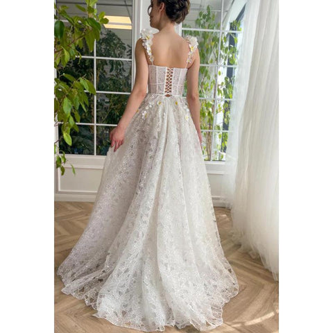 Vestido largo de noche de fiesta corte A con escote corazón, apliques de encaje transparente y abertura 