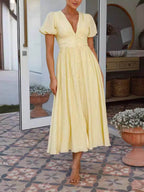 Robe longue oversize à manches bouffantes et col en V 