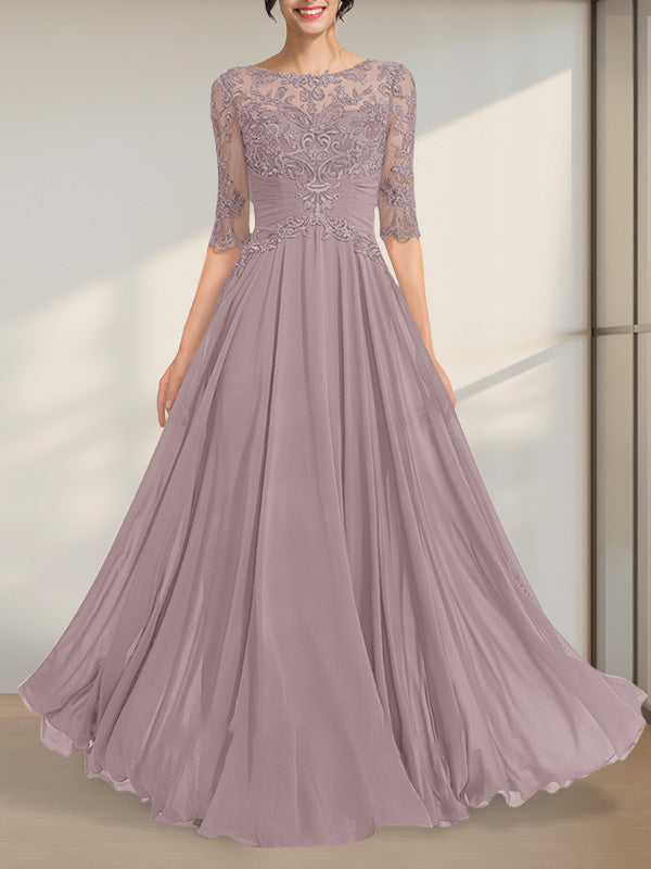 Robe de mère de la mariée en mousseline de soie et dentelle, coupe trapèze, longueur au sol, décolleté illusion, ornée de sequins plissés
