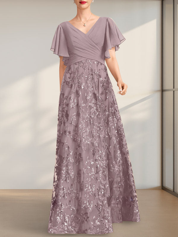 Vestido de novia de corte A, escote en V, largo hasta el suelo, de encaje, lentejuelas y gasa, con pliegues.