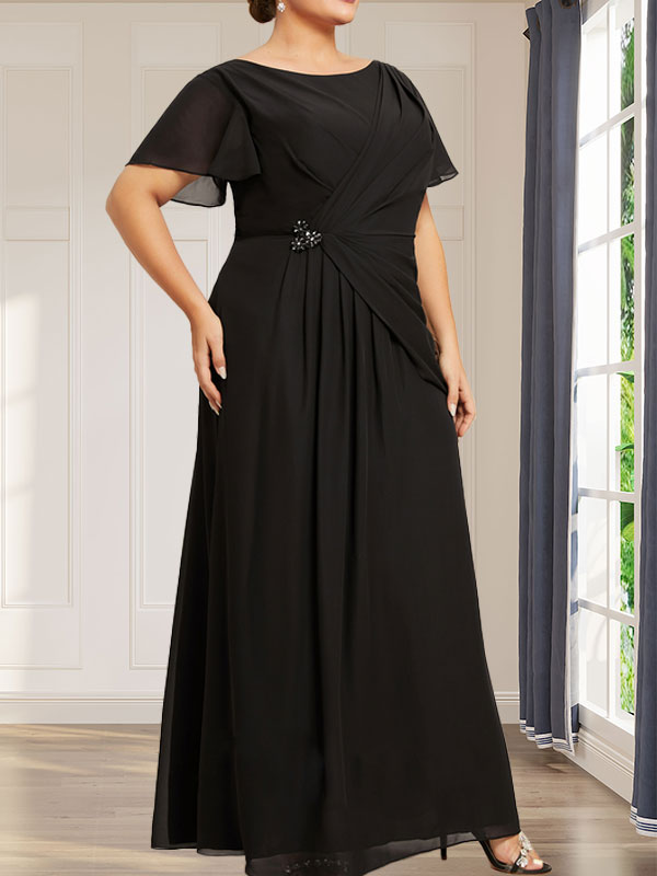 Robe de mère de la mariée en mousseline de soie, coupe trapèze, longueur cheville, ornée de perles et plissée, avec décolleté rond et ourlet arrondi.