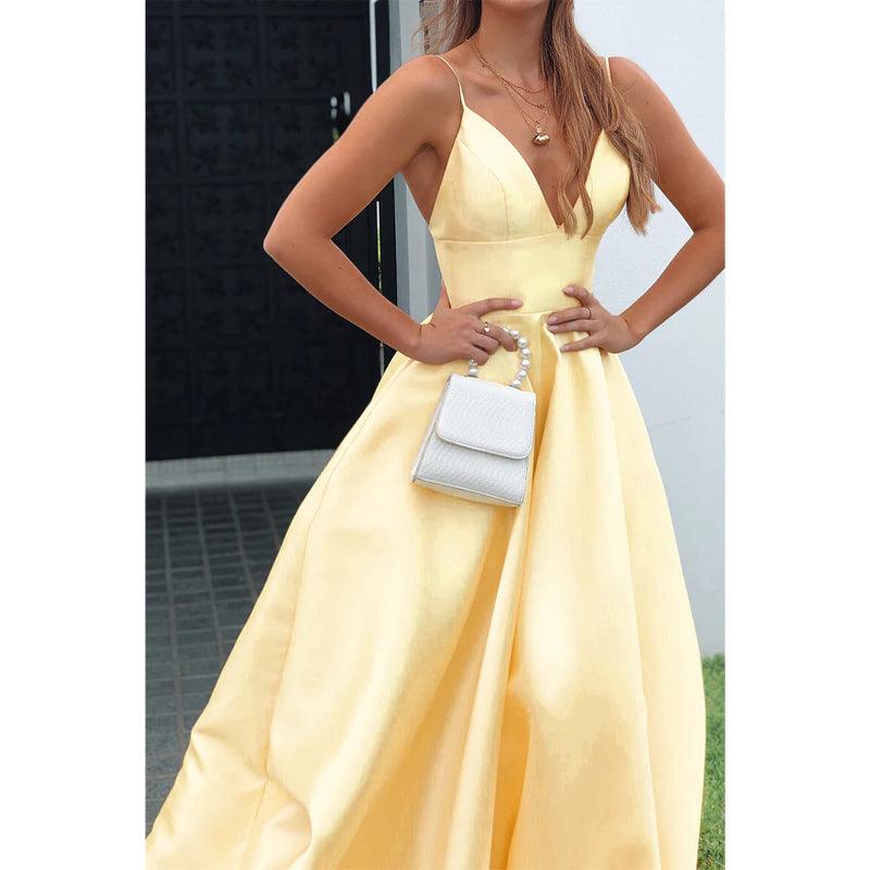 Vestido de fiesta de satén amarillo con escote en V pronunciado y bolsillos 
