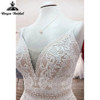 Robe de mariée style bohème rose blush, coupe trapèze, bretelles spaghetti, dos nu, style ROY025