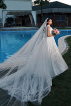 Vestidos de novia de corte A, encantadores, sin mangas, de tul, hasta el suelo, con escote en V y apliques.