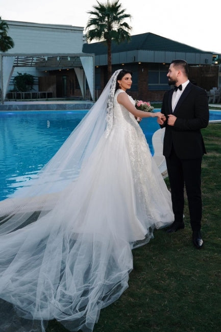 Vestidos de novia de corte A, encantadores, sin mangas, de tul, hasta el suelo, con escote en V y apliques.