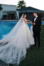 Vestidos de novia de corte A, encantadores, sin mangas, de tul, hasta el suelo, con escote en V y apliques.