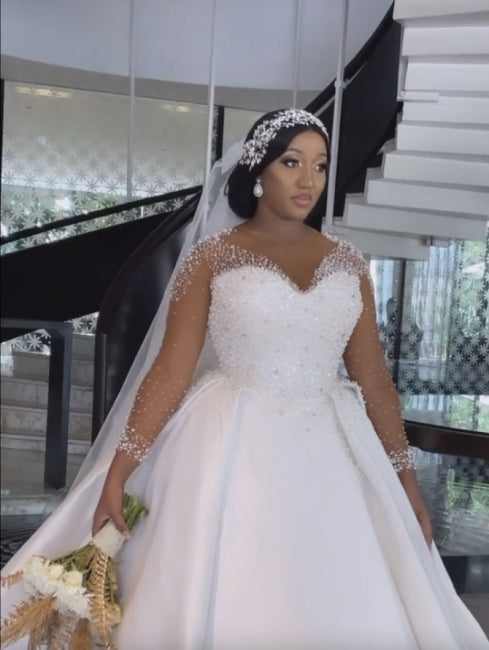 Vestidos de novia exquisitos de corte línea A, largos hasta el suelo, de manga larga, con encaje, escote en V y tul con pedrería.