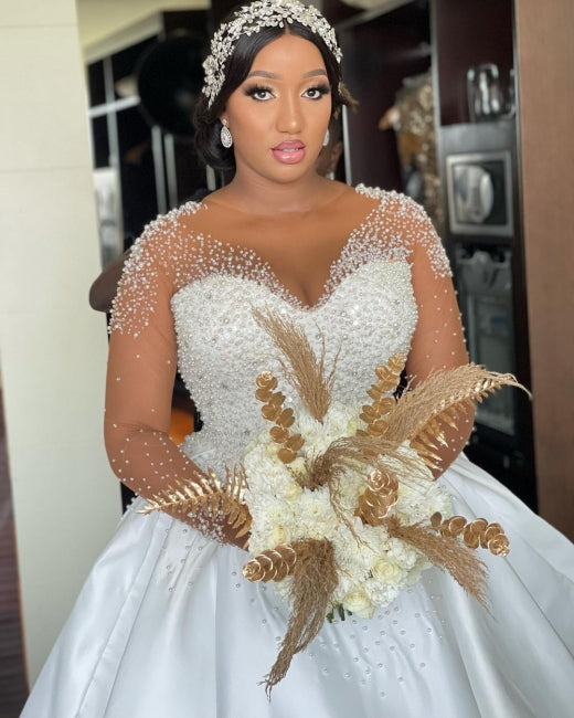 Vestidos de novia exquisitos de corte línea A, largos hasta el suelo, de manga larga, con encaje, escote en V y tul con pedrería.