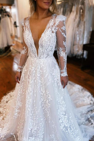 Vestidos de novia de tul con escote en V, corte en A, manga larga y hasta el suelo, con apliques.