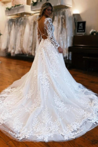Vestidos de novia de tul con escote en V, corte en A, manga larga y hasta el suelo, con apliques.