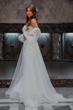 Vestidos de novia de corte sirena, sin tirantes, de tul y con encaje, de línea A y largo hasta el suelo.