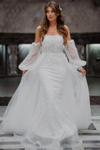 Vestidos de novia de corte sirena, sin tirantes, de tul y con encaje, de línea A y largo hasta el suelo.