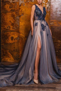 Vestidos de graduación de corte A, escote en V, sin mangas, largos hasta el suelo, con abertura frontal y apliques.