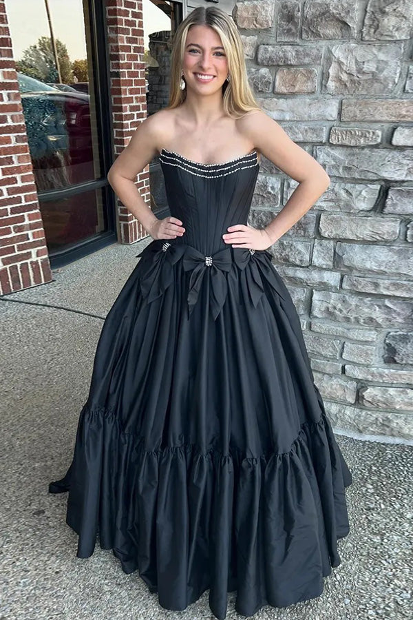 Vestido de fiesta negro de corte A, sin tirantes, con corsé y lazos, con cuentas.