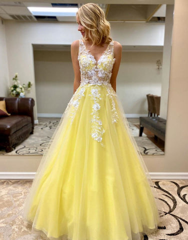 Robe de soirée longue trapèze avec appliques