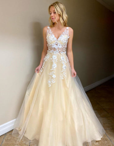 Robe de soirée longue trapèze avec appliques