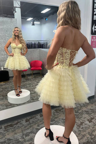 Vestido de fiesta amarillo sin tirantes con corsé y volantes de corte en A PD518