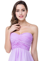 Vestido de dama de honor de gasa sin tirantes de corte A con drapeado