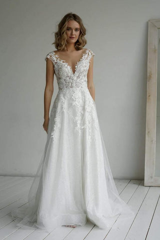 Vestido de novia corte A, elegante, con escote corazón, confeccionado en tela brillante y apliques WD570