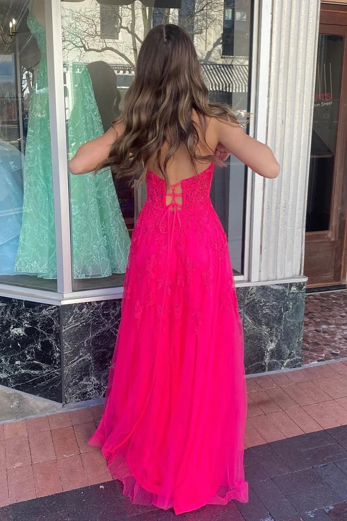Vestido largo de fiesta corte A, rosa fucsia sin tirantes con apliques florales