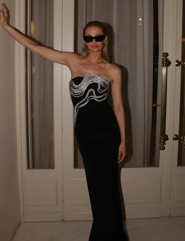 Vestido largo ajustado de alta calidad, color negro, ideal para fiestas de noche o eventos de celebridades en la alfombra roja. Vestido largo sexy sin tirantes con pedrería y vendaje.