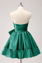 Vestido de fiesta corto fucsia sin tirantes con volantes y lazo PD558
