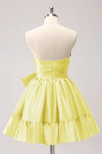 Vestido de fiesta corto fucsia sin tirantes con volantes y lazo PD558