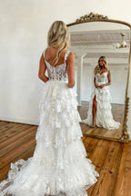 Vestido de noche de fiesta impresionante, de encaje, corte en A, con volantes y abertura.