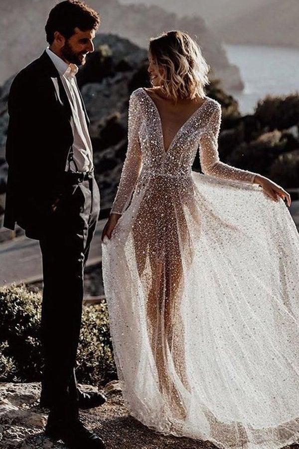 Vestido de novia brillante de corte línea, escote en V profundo y mangas largas con transparencias WD569