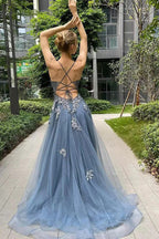 Vestido largo de fiesta de corte A con tirantes finos, corsé y abertura en la espalda
