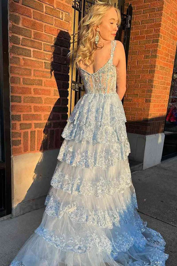Vestido de noche de fiesta impresionante, de encaje, corte en A, con volantes y abertura.