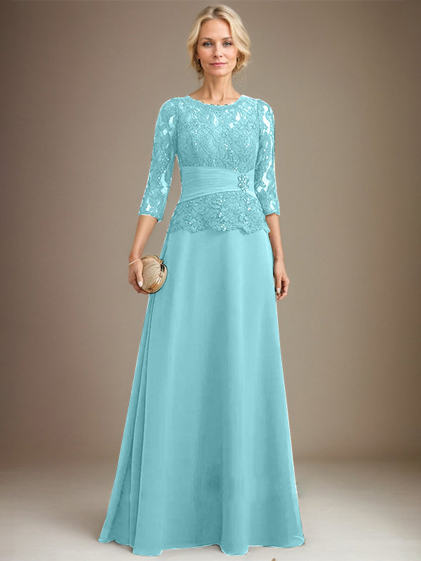 Vestido de corte A, escote ilusión, largo hasta el suelo, de gasa y encaje, para la madre de la novia, con lentejuelas plisadas y pedrería. 