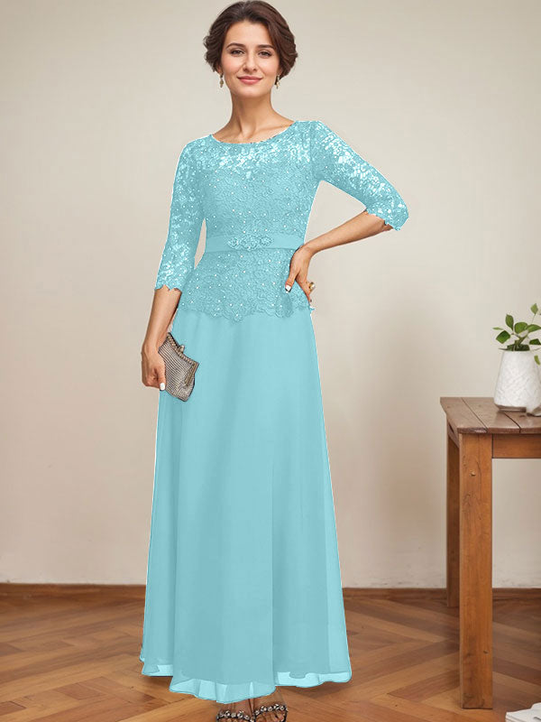 Vestido de novia corte A, escote redondo ilusión, largo hasta el tobillo, de gasa y encaje, con pedrería y detalles de diamantes de imitación. 
