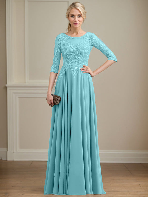 Vestido de novia de corte A, escote redondo, ilusión, largo hasta el suelo, de encaje y gasa con lentejuelas. 