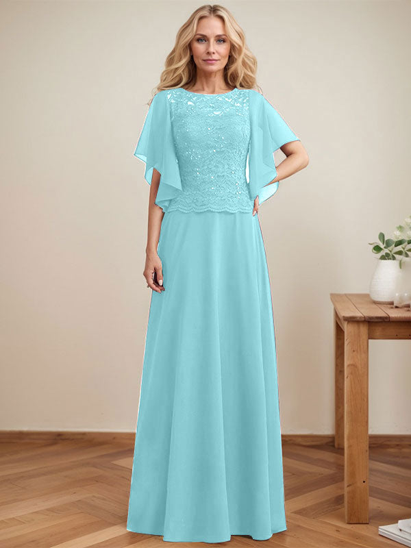 Vestido de novia de corte A, escote redondo, ilusión, largo hasta el suelo, de encaje y gasa con lentejuelas. 
