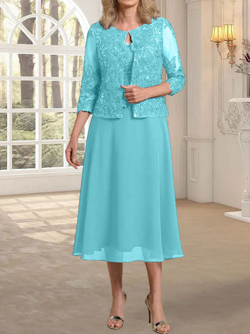 Vestido de novia de corte línea A, escote redondo, largo hasta la rodilla, de encaje y gasa con lentejuelas. 