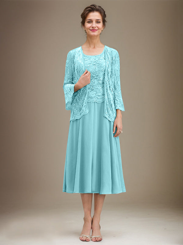 Vestido de novia de corte línea A, escote redondo, largo hasta la rodilla, de encaje y gasa con lentejuelas. 
